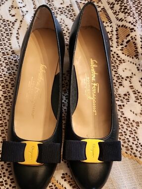 Salvatore Ferragamo Navy Leather Bow Flats with Gold Plaque